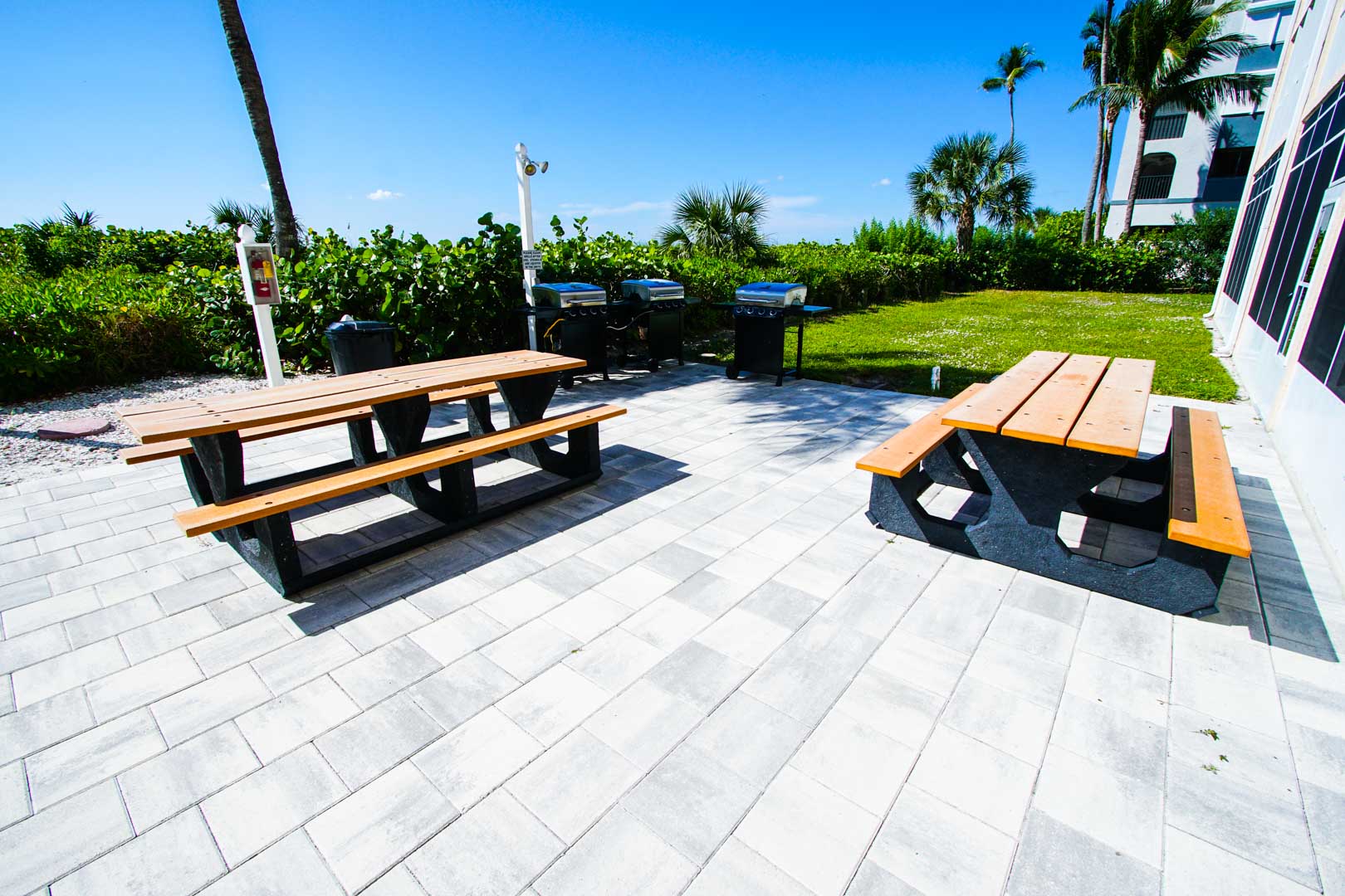 BBQ grills by the beach at VRI's Windward Passage Resort in Fort Myers Beach, Florida.